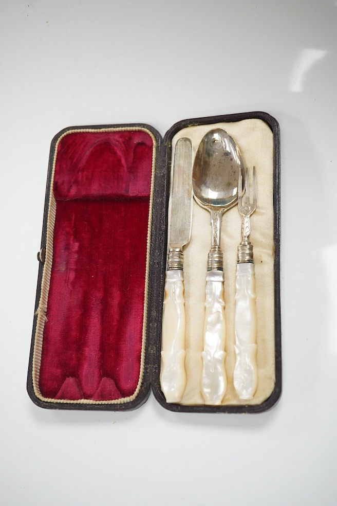 A group of assorted small silverwares including a Victorian toilet jar, a set of six teaspoons and a cased fork and spoon christening set, 8.5 oz of weighable silver, and a cased knife, spoon and fork christening set wit